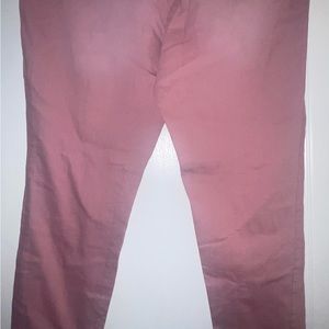 Blush denim distressed stretch jeans.